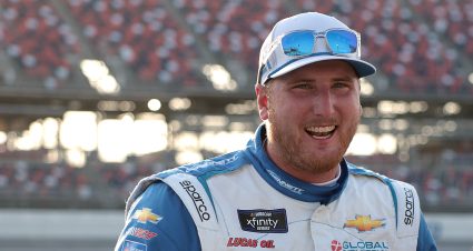 TALLADEGA, ALABAMA - APRIL 19: Austin Hill, driver of the #21 Bennett Transportation Chevrolet, laughs on the grid during qualifying for the NASCAR Xfinity Series  Ag-Pro 300 at Talladega Superspeedway on April 19, 2024 in Talladega, Alabama. (Photo by James Gilbert/Getty Images) | Getty Images