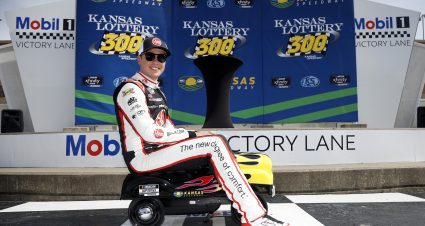 KANSAS CITY, KANSAS - SEPTEMBER 28: Christopher Bell, driver of the #20 Rheem Toyota, poses on a toy car for photos after winning the pole award during qualifying for the NASCAR Cup Series Hollywood Casino 400 Presented by ESPN BET at Kansas Speedway on September 28, 2024 in Kansas City, Kansas. (Photo by Sean Gardner/Getty Images) | Getty Images