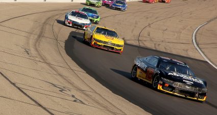 NEWTON, IOWA - JUNE 16: Ryan Blaney, driver of the #12 Advance Auto Parts Ford, leads a pack of cars during the NASCAR Cup Series Iowa Corn 350 at Iowa Speedway on June 16, 2024 in Newton, Iowa. (Photo by Jonathan Bachman/Getty Images) | Getty Images