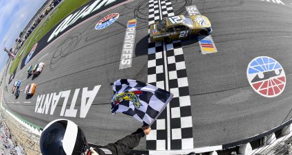 HAMPTON, GEORGIA - SEPTEMBER 07: Austin Hill, driver of the #21 Bennett Transportation Chevrolet, takes the checkered flag to win the NASCAR Xfinity Series Focused Health 250 at Atlanta Motor Speedway on September 07, 2024 in Hampton, Georgia. (Photo by Logan Riely/Getty Images) | Getty Images