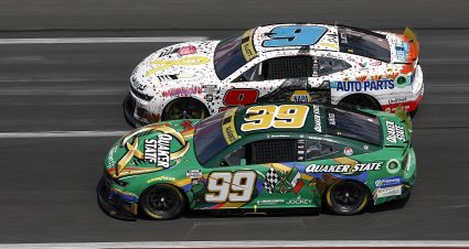 HAMPTON, GEORGIA - SEPTEMBER 08: Daniel Suarez, driver of the #99 Quaker State Chevrolet, and Chase Elliott, driver of the #9 NAPA/Children's Chevrolet, race during the NASCAR Cup Series Quaker State 400 Available at Walmart at Atlanta Motor Speedway on September 08, 2024 in Hampton, Georgia. (Photo by Sean Gardner/Getty Images) | Getty Images