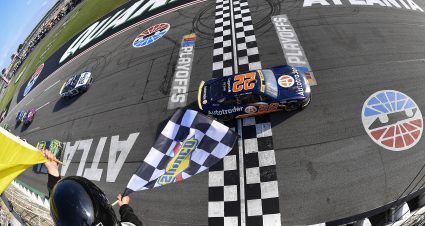 HAMPTON, GEORGIA - SEPTEMBER 08: Joey Logano, driver of the #22 Autotrader Ford, takes the checkered flag under caution to win the NASCAR Cup Series Quaker State 400 Available at Walmart at Atlanta Motor Speedway on September 08, 2024 in Hampton, Georgia. (Photo by Logan Riely/Getty Images) | Getty Images