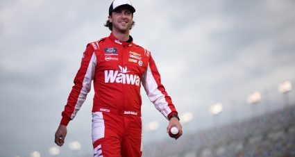 DAYTONA BEACH, FLORIDA - AUGUST 23: Josh Bilicki, driver of the #92 Wawa Chevrolet, walks onstage during driver intros prior to  the NASCAR Xfinity Series Wawa 250 Powered by Coca-Cola at Daytona International Speedway on August 23, 2024 in Daytona Beach, Florida. (Photo by James Gilbert/Getty Images) | Getty Images