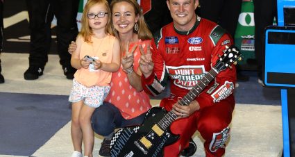 LEBANON, TENNESSEE - JUNE 24: Ryan Preece, driver of the #17 Hunt Brothers Pizza Ford, celebrates with his wife Heather  and NASCAR Cup driver Kevin Harvick, daughter Piper in victory lane after winning  the NASCAR Camping World Truck Series Rackley Roofing 200 at Nashville Superspeedway on June 24, 2022 in Lebanon, Tennessee. (Photo by Meg Oliphant/Getty Images) | Getty Images