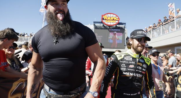 LAS VEGAS, NEVADA - OCTOBER 12: WWE wrestler Damian Priest and Ryan Blaney, driver of the #12 Menards/Cardell Cabinetry Ford, walk the red carpet prior to the NASCAR Cup Series South Point 400 at Las Vegas Motor Speedway on October 12, 2025 in Las Vegas, Nevada. (Photo by Logan Riely/Getty Images) | Getty Images