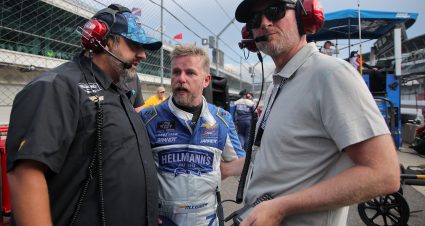 INDIANAPOLIS, INDIANA - JULY 26: Justin Allgaier, driver of the #7 Hellmann's Spicy Mayo Chevrolet, (C) speaks to crew chief Jim Pohlman (L) and Hall of Famer and JR Motorsports team owner, Dale Earnhardt Jr. reacts after an on-track incident during the NASCAR Xfinity Series Pennzoil 250 at Indianapolis Motor Speedway on July 26, 2025 in Indianapolis, Indiana. (Photo by Jonathan Bachman/Getty Images) | Getty Images