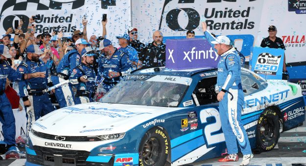 TALLADEGA, ALABAMA - OCTOBER 18: Austin Hill, driver of the #21 Bennett Transportation Chevrolet, celebrates in victory lane after winning during the NASCAR Xfinity Series United Rentals 250 at Talladega Superspeedway on October 18, 2025 in Talladega, Alabama. (Photo by Chris Graythen/Getty Images) | Getty Images
