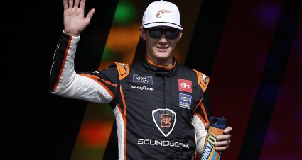 TALLADEGA, ALABAMA - OCTOBER 18: William Sawalich, driver of the #18 Soundgear Toyota, waves to fans as he walks onstage during driver intros prior to the NASCAR Xfinity Series United Rentals 250 at Talladega Superspeedway on October 18, 2025 in Talladega, Alabama. (Photo by Sean Gardner/Getty Images) | Getty Images