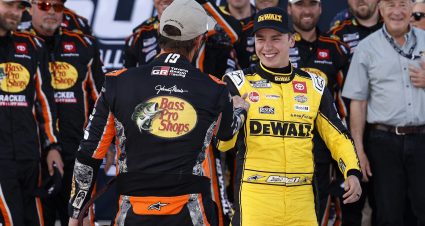 TALLADEGA, ALABAMA - OCTOBER 19: Christopher Bell, driver of the #20 DEWALT Toyota, (R) congratulates Chase Briscoe, driver of the #19 Bass Pro Shops Toyota, in victory lane for winning the NASCAR Cup Series YellaWood 500 at Talladega Superspeedway on October 19, 2025 in Talladega, Alabama. (Photo by Sean Gardner/Getty Images) | Getty Images