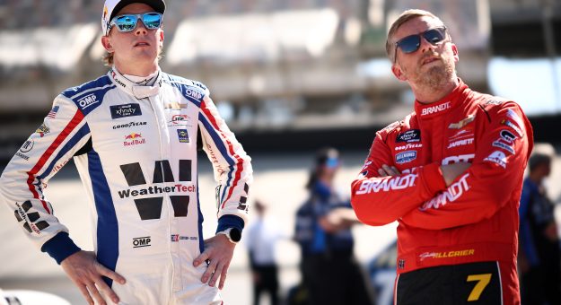 BRISTOL, TENNESSEE - SEPTEMBER 12: Connor Zilisch, driver of the #88 WeatherTech Chevrolet, (L) and Justin Allgaier, driver of the #7 BRANDT/Precision Build Chevrolet, look on during qualifying for the NASCAR Xfinity Series Food City 300 at Bristol Motor Speedway on September 12, 2025 in Bristol, Tennessee. (Photo by Jared C. Tilton/Getty Images) | Getty Images