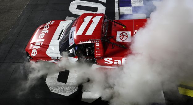 MARTINSVILLE, VIRGINIA - OCTOBER 24: Corey Heim, driver of the #11 Safelite Toyota, celebrates with a burnout after winning the NASCAR Craftsman Truck Slim Jim 200 at Martinsville Speedway on October 24, 2025 in Martinsville, Virginia. (Photo by David Jensen/Getty Images) | Getty Images