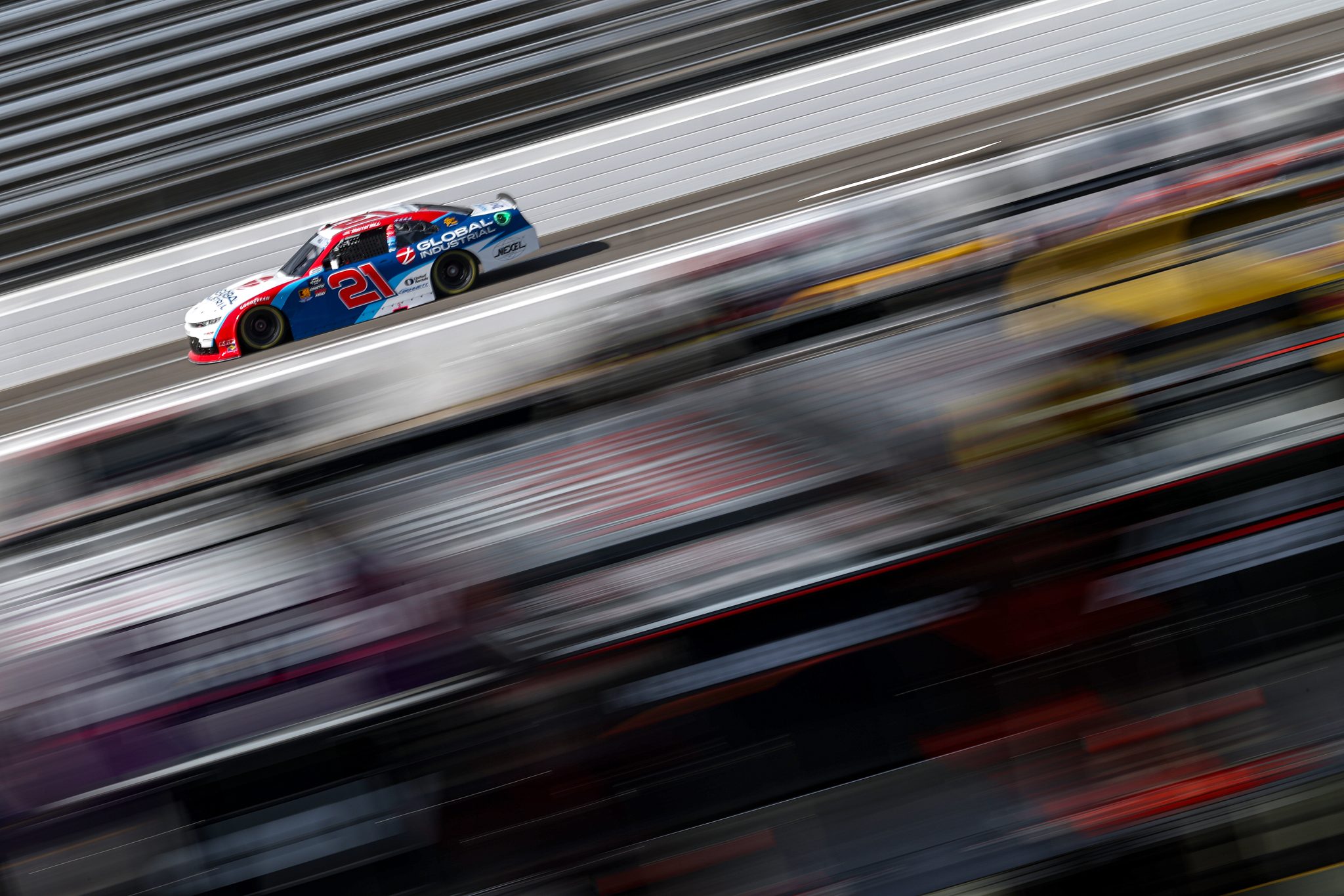 MARTINSVILLE, VIRGINIA - OCTOBER 25: Austin Hill, driver of the #21 Global Industrial Chevrolet, drives during practice for the NASCAR Xfinity Series IAA and Ritchie Bros. 250 at Martinsville Speedway on October 25, 2025 in Martinsville, Virginia. (Photo by Jared C. Tilton/Getty Images) | Getty Images