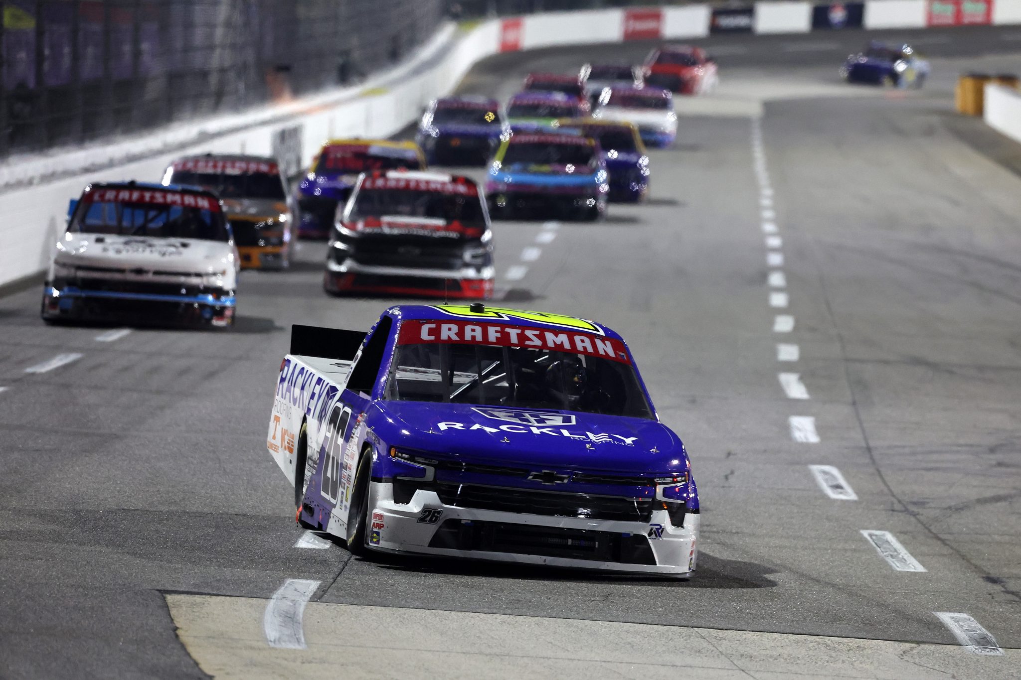 MARTINSVILLE, VIRGINIA - OCTOBER 24: Dawson Sutton, driver of the #26 Rackley Roofing Chevrolet, drives during the NASCAR Craftsman Truck Slim Jim 200 at Martinsville Speedway on October 24, 2025 in Martinsville, Virginia. (Photo by David Jensen/Getty Images) | Getty Images