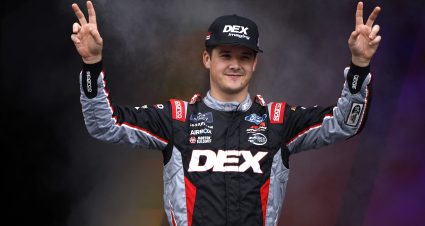 TALLADEGA, ALABAMA - OCTOBER 18: Harrison Burton, driver of the #25 DEX Imaging Ford, waves to fans as he walks onstage during driver intros prior to the NASCAR Xfinity Series United Rentals 250 at Talladega Superspeedway on October 18, 2025 in Talladega, Alabama. (Photo by Sean Gardner/Getty Images) | Getty Images