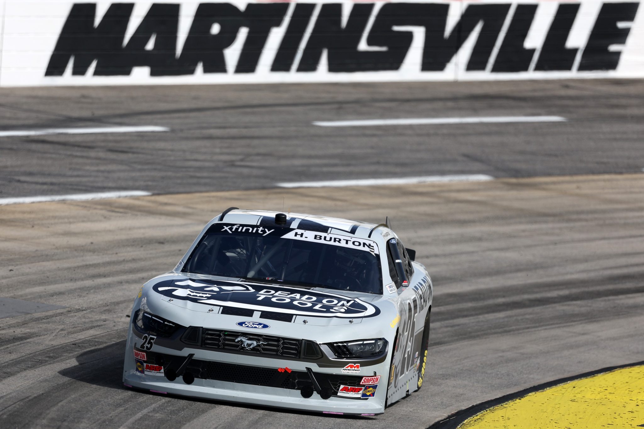 MARTINSVILLE, VIRGINIA - OCTOBER 25: Harrison Burton, driver of the #25 Dead On Tools Ford, drives during practice for the NASCAR Xfinity Series IAA and Ritchie Bros. 250 at Martinsville Speedway on October 25, 2025 in Martinsville, Virginia. (Photo by David Jensen/Getty Images) | Getty Images