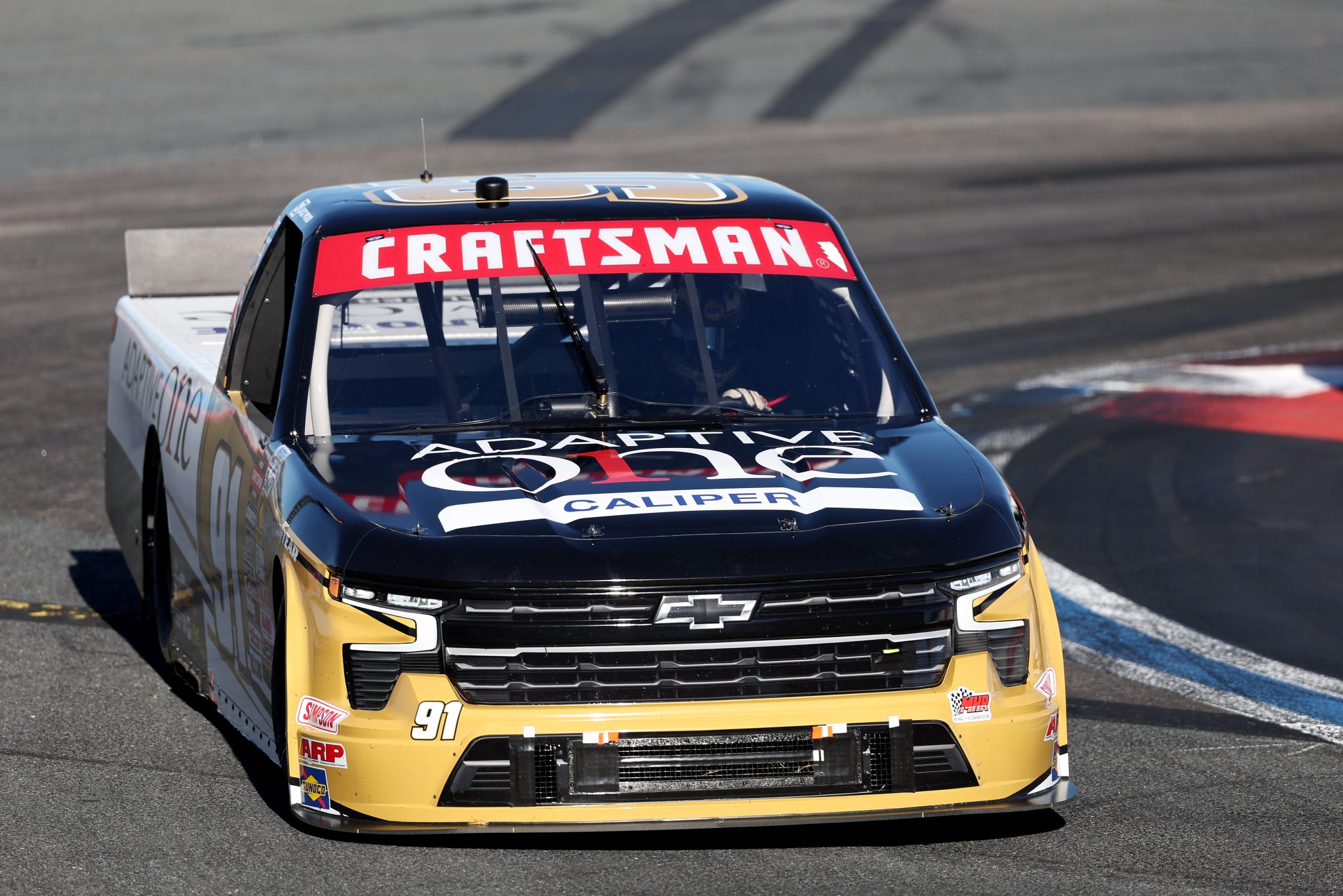 CONCORD, NORTH CAROLINA - OCTOBER 03: Jack Wood, driver of the #91 Adaptive One Calipers Chevrolet, drives during the NASCAR Craftsman Truck Series EcoSave 250 at Charlotte Motor Speedway on October 03, 2025 in Concord, North Carolina. (Photo by David Jensen/Getty Images) | Getty Images