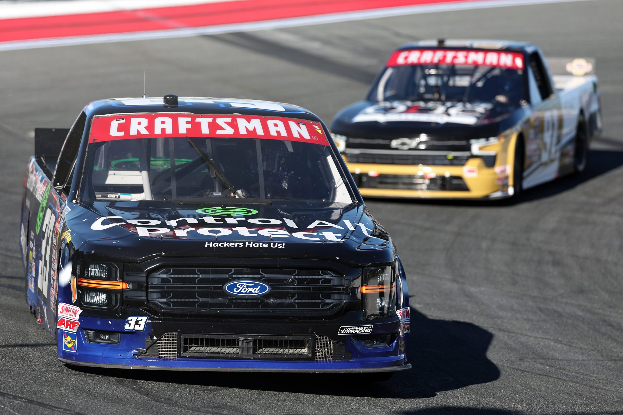CONCORD, NORTH CAROLINA - OCTOBER 03: Mason Maggio, driver of the #33 Control Alt Protect Ford, drives during the NASCAR Craftsman Truck Series EcoSave 250 at Charlotte Motor Speedway on October 03, 2025 in Concord, North Carolina. (Photo by David Jensen/Getty Images) | Getty Images
