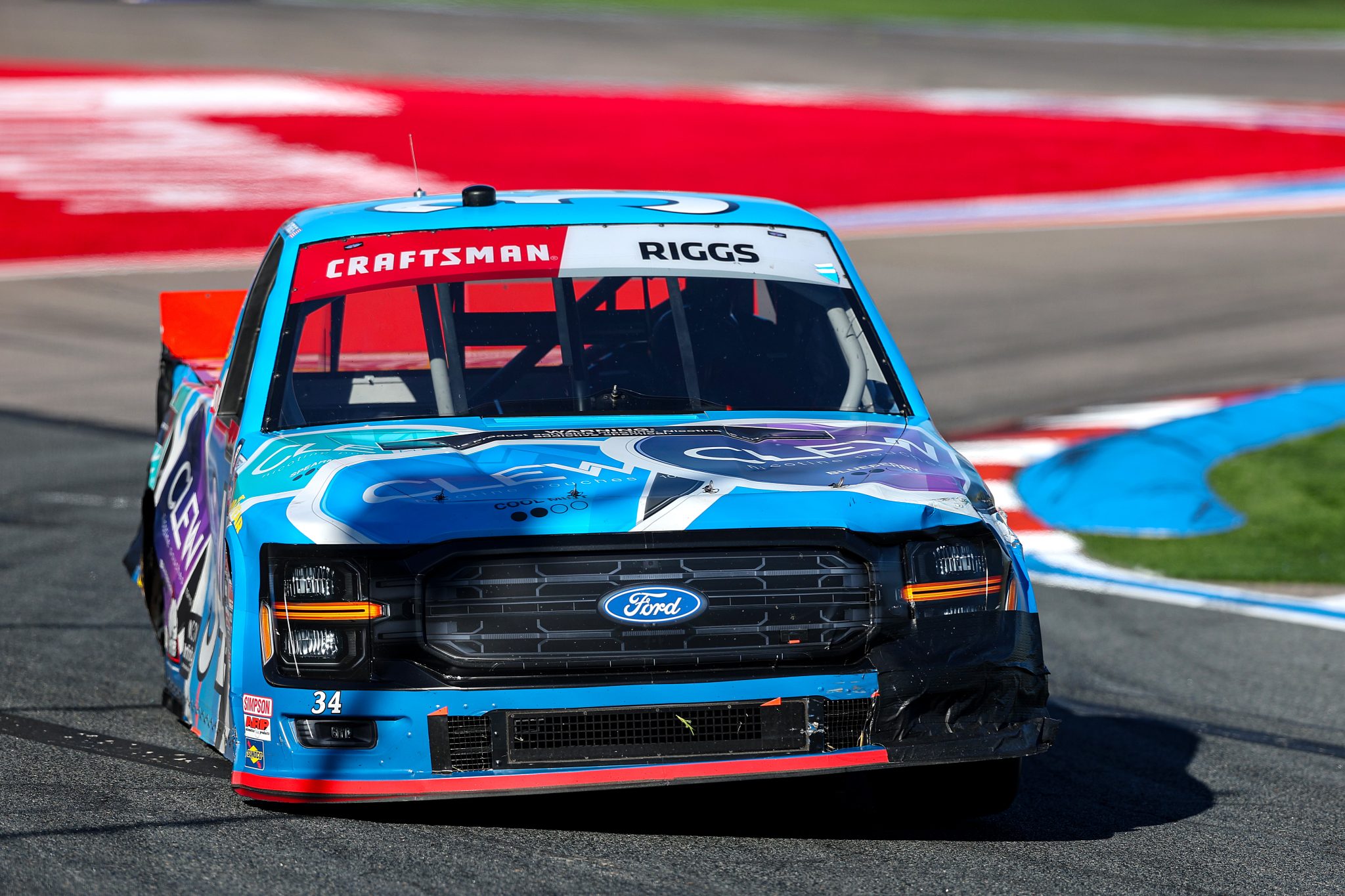 CONCORD, NORTH CAROLINA - OCTOBER 03: Layne Riggs, driver of the #34 Clew Ford, drives a damaged truck during the NASCAR Craftsman Truck Series EcoSave 250 at Charlotte Motor Speedway on October 03, 2025 in Concord, North Carolina. (Photo by David Jensen/Getty Images) | Getty Images
