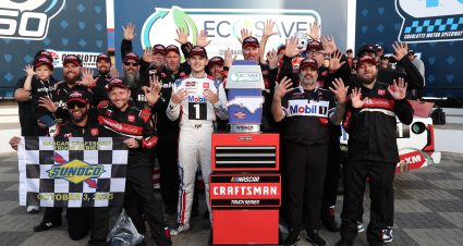 CONCORD, NORTH CAROLINA - OCTOBER 03: Corey Heim, driver of the #11 Mobil 1 Toyota, and crew celebrate in victory lane after winning  the NASCAR Craftsman Truck Series EcoSave 250, for the record-breaking 10th truck win of the season at Charlotte Motor Speedway on October 03, 2025 in Concord, North Carolina. (Photo by David Jensen/Getty Images) | Getty Images