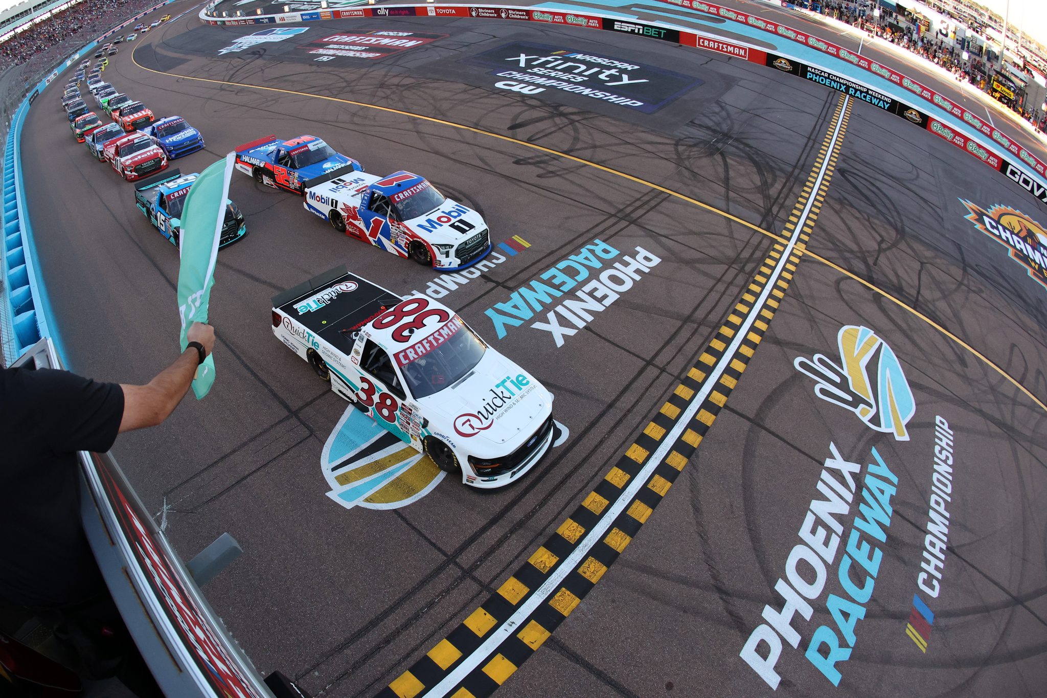 AVONDALE, ARIZONA - OCTOBER 31: Chandler Smith, driver of the #38 QuickTie Ford, leads the field to the green flag to start the NASCAR Craftsman Truck Series Championship at Phoenix Raceway on October 31, 2025 in Avondale, Arizona. (Photo by Meg Oliphant/Getty Images) | Getty Images