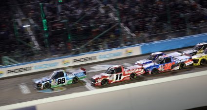 AVONDALE, ARIZONA - OCTOBER 31: Ty Majeski, driver of the #98 Soda Sense/Curb Records Ford, and Corey Heim, driver of the #11 Safelite Toyota, lead the field during the NASCAR Craftsman Truck Series Championship at Phoenix Raceway on October 31, 2025 in Avondale, Arizona. (Photo by James Gilbert/Getty Images) | Getty Images