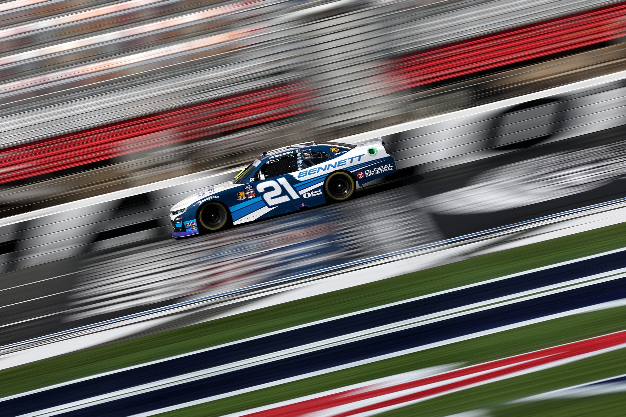 CONCORD, NORTH CAROLINA - OCTOBER 04: Austin Hill, driver of the #21 Bennett Transportation Chevrolet, drives during practice for the NASCAR Xfinity Series Blue Cross NC 250 at Charlotte Motor Speedway on October 04, 2025 in Concord, North Carolina. (Photo by Jared C. Tilton/Getty Images) | Getty Images