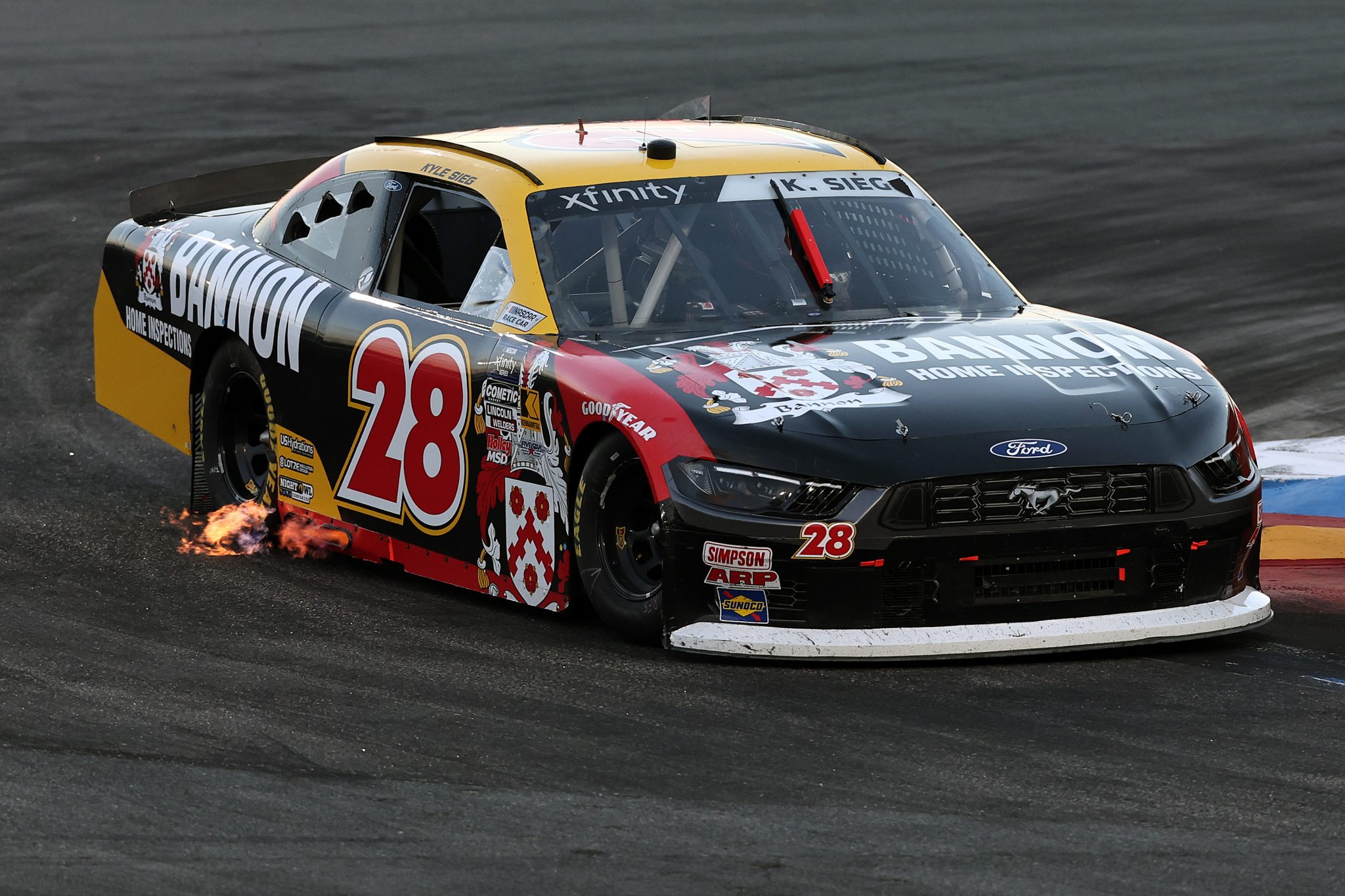 CONCORD, NORTH CAROLINA - OCTOBER 04: Kyle Sieg, driver of the #28 Bannon Home Inspection Ford, drives during the NASCAR Xfinity Series Blue Cross NC 250 at Charlotte Motor Speedway on October 04, 2025 in Concord, North Carolina. (Photo by David Jensen/Getty Images) | Getty Images