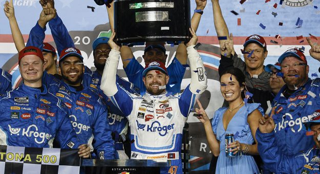 DAYTONA BEACH, FLORIDA - FEBRUARY 19: Ricky Stenhouse Jr., driver of the #47 Kroger/Cottonelle Chevrolet, lifts the Harley J. Earl trophy in victory lane after winning the NASCAR Cup Series 65th Annual Daytona 500 at Daytona International Speedway on February 19, 2023 in Daytona Beach, Florida. (Photo by Chris Graythen/Getty Images) | Getty Images