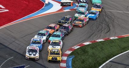 CONCORD, NORTH CAROLINA - OCTOBER 05: Shane Van Gisbergen, driver of the #88 WeatherTech Chevrolet, and Christopher Bell, driver of the #20 DEWALT Toyota, lead the field during the NASCAR Cup Series Bank of America ROVAL 400 at Charlotte Motor Speedway on October 05, 2025 in Concord, North Carolina. (Photo by David Jensen/Getty Images) | Getty Images