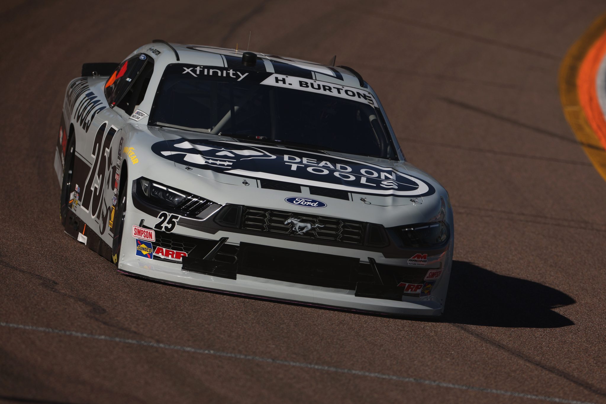 AVONDALE, ARIZONA - NOVEMBER 01: Harrison Burton, driver of the #25 Dead On Tools Ford, drives during qualifying for the NASCAR Xfinity Series Championship at Phoenix Raceway on November 01, 2025 in Avondale, Arizona. (Photo by James Gilbert/Getty Images) | Getty Images