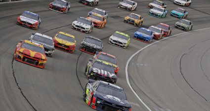 JOLIET, ILLINOIS - JUNE 30: Alex Bowman, driver of the #88 Axalta Chevrolet, leads the pack out of turn four following a restart during the Monster Energy NASCAR Cup Series Camping World 400 at Chicagoland Speedway on June 30, 2019 in Joliet, Illinois. (Photo by Jonathan Daniel/Getty Images) | Getty Images