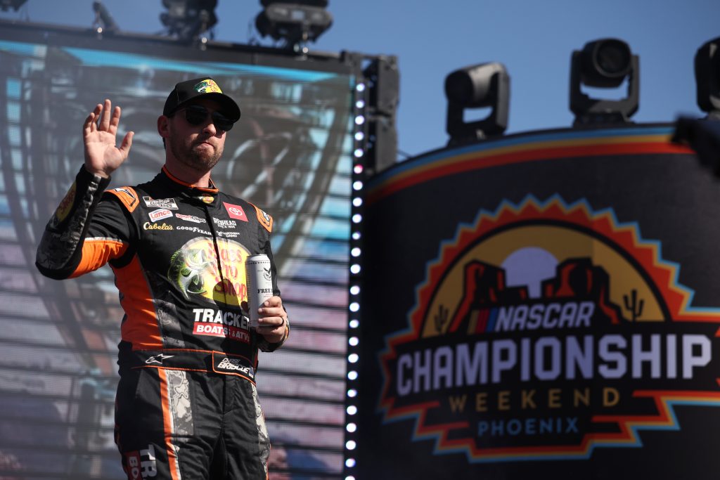 AVONDALE, ARIZONA - NOVEMBER 02: Chase Briscoe, driver of the #19 Bass Pro Shops Toyota, waves to fans as he walks onstage during driver intros prior to the NASCAR Cup Series Championship at Phoenix Raceway on November 02, 2025 in Avondale, Arizona. (Photo by James Gilbert/Getty Images) | Getty Images