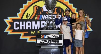 AVONDALE, ARIZONA - NOVEMBER 02:  Kyle Larson, driver of the #5 HendrickCars.com Chevrolet, celebrates with his wife, Katelyn Larson sons, Cooper Larson and Owen Larson and daughter Audrey Larson in victory lane after after finish first of the NASCAR Cup Series Championship 4 drivers to win the NASCAR Cup Series Championship at Phoenix Raceway on November 02, 2025 in Avondale, Arizona. (Photo by Meg Oliphant/Getty Images) | Getty Images
