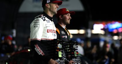 DAYTONA BEACH, FLORIDA - FEBRUARY 12: Pole Award winner, Chase Briscoe, driver of the #19 Bass Pro Shops Toyota  (R) and Front Row winner, Austin Cindric, driver of the #2 Discount Tire Ford  pose for photos during qualifying for the NASCAR Cup Series Daytona 500 at Daytona International Speedway on February 12, 2025 in Daytona Beach, Florida. (Photo by James Gilbert/Getty Images) | Getty Images