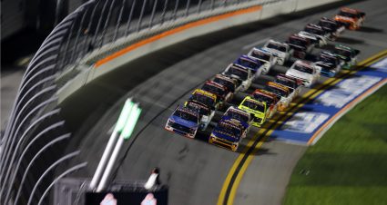 DAYTONA BEACH, FLORIDA - FEBRUARY 16: Tyler Ankrum, driver of the #18 LiUNA! Chevrolet, and Ben Rhodes, driver of the #99 Ranch Fuel Energy Drink Ford, lead the field during the NASCAR Craftsman Truck Series Fresh from Florida 250 at Daytona International Speedway on February 16, 2024 in Daytona Beach, Florida. (Photo by James Gilbert/Getty Images) | Getty Images