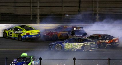 DAYTONA BEACH, FLORIDA - FEBRUARY 16: Kyle Busch, driver of the #8 zone Chevrolet, Ryan Blaney, driver of the #12 Menards/Peak Ford and Joey Logano, driver of the #22 Shell Pennzoil Ford spin after an on-track incident during the NASCAR Cup Series Daytona 500 at Daytona International Speedway on February 16, 2025 in Daytona Beach, Florida. (Photo by Mike Ehrmann/Getty Images) | Getty Images