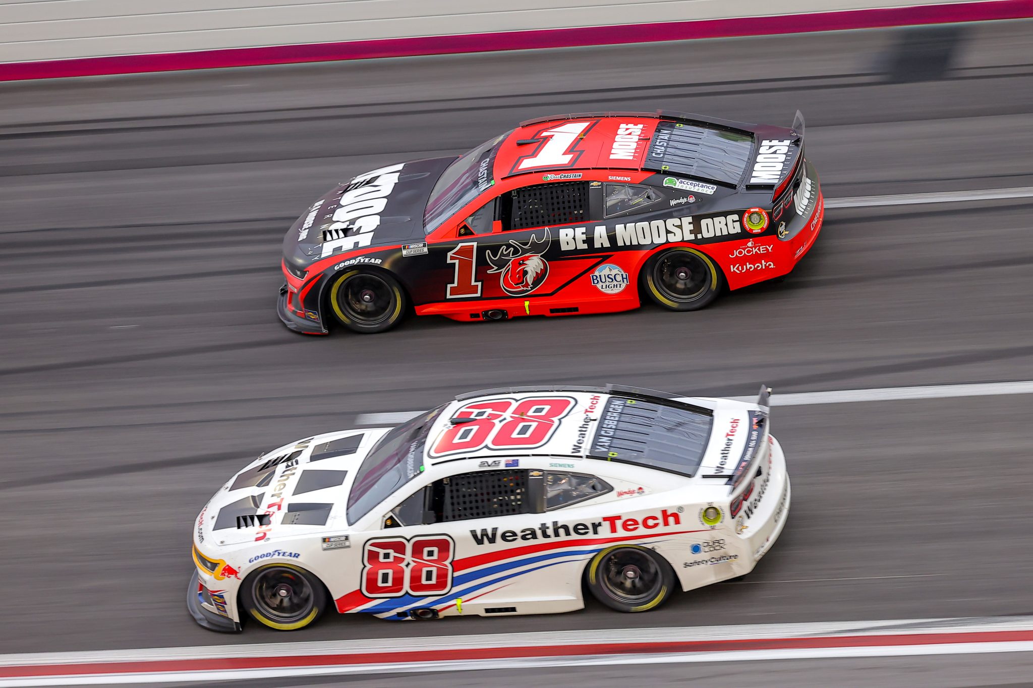 HAMPTON, GEORGIA - FEBRUARY 23: Ross Chastain, driver of the #1 Moose Fraternity Chevrolet, and Shane Van Gisbergen, driver of the #88 WeatherTech Chevrolet, race during the NASCAR Cup Series Ambetter Health 400 at Atlanta Motor Speedway on February 23, 2025 in Hampton, Georgia. (Photo by Jonathan Bachman/Getty Images) | Getty Images