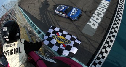 HOMESTEAD, FLORIDA - MARCH 23: Kyle Larson, driver of the #5 HendrickCars.com Chevrolet, takes the checkered flag to win the NASCAR Cup Series Straight Talk Wireless 400 at Homestead-Miami Speedway on March 23, 2025 in Homestead, Florida. (Photo by Chris Graythen/Getty Images) | Getty Images