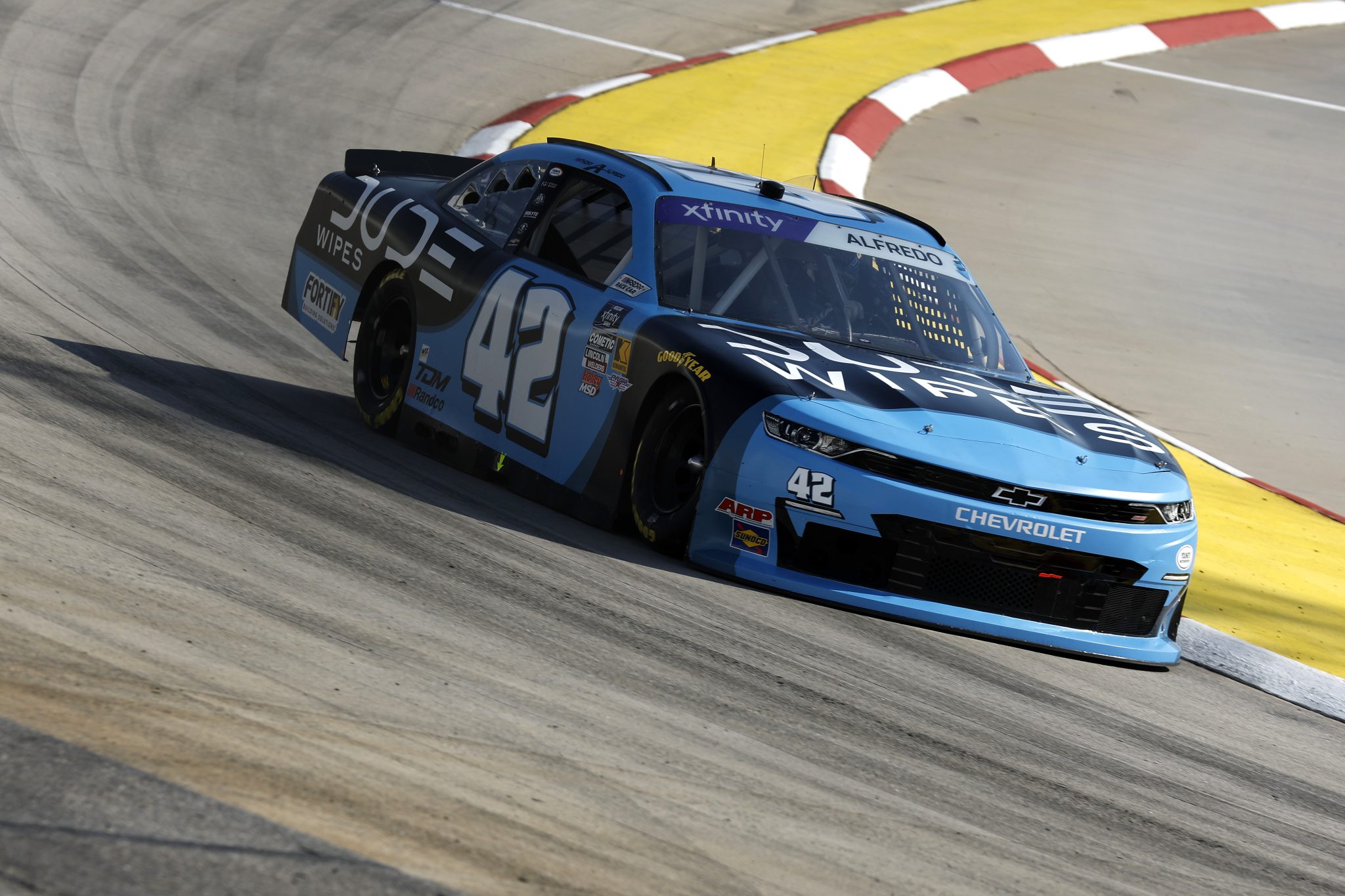 MARTINSVILLE, VIRGINIA - MARCH 28: Anthony Alfredo, driver of the #42 Dude Wipes Chevrolet, drives during practice for the NASCAR Xfinity Series US Marine Corps 250 at Martinsville Speedway on March 28, 2025 in Martinsville, Virginia. (Photo by Logan Riely/Getty Images) | Getty Images