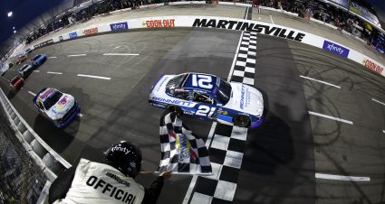 MARTINSVILLE, VIRGINIA - MARCH 29: Austin Hill, driver of the #21 Bennett Transportation Chevrolet, takes the checkered flag to win the NASCAR Xfinity Series US Marine Corps 250 at Martinsville Speedway on March 29, 2025 in Martinsville, Virginia. (Photo by Logan Riely/Getty Images) | Getty Images