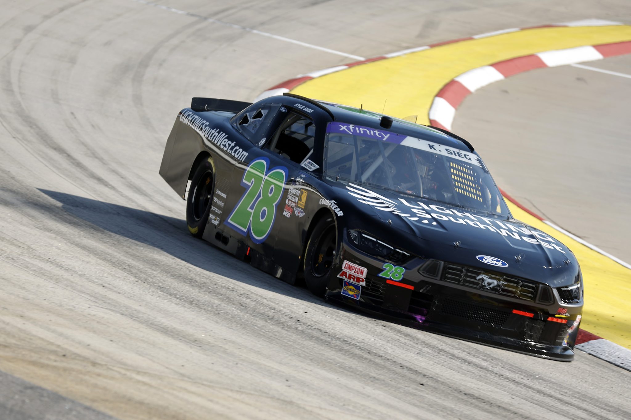 MARTINSVILLE, VIRGINIA - MARCH 28: Kyle Sieg, driver of the #28 Lightingsouthwest.com Ford, drives during practice for the NASCAR Xfinity Series US Marine Corps 250 at Martinsville Speedway on March 28, 2025 in Martinsville, Virginia. (Photo by Logan Riely/Getty Images) | Getty Images