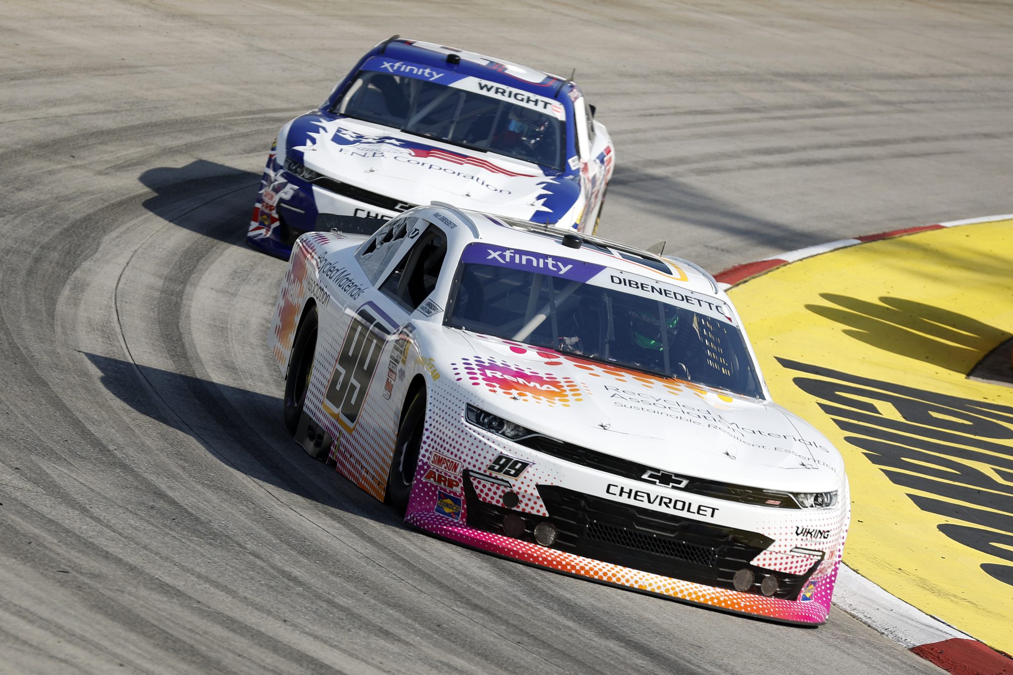 MARTINSVILLE, VIRGINIA - MARCH 28: Matt DiBenedetto, driver of the #99 ReMA Chevrolet, and Kris Wright, driver of the #5 First National Bank Corp Chevrolet, drive during practice for the NASCAR Xfinity Series US Marine Corps 250 at Martinsville Speedway on March 28, 2025 in Martinsville, Virginia. (Photo by Logan Riely/Getty Images) | Getty Images