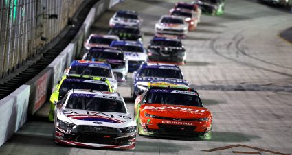 BRISTOL, TENNESSEE - SEPTEMBER 20: Ryan Sieg, driver of the #39 Sci Aps Ford, and Justin Allgaier, driver of the #7 BRANDT Chevrolet, race during the NASCAR Xfinity Series Food City 300 at Bristol Motor Speedway on September 20, 2024 in Bristol, Tennessee. (Photo by James Gilbert/Getty Images) | Getty Images