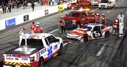 MARTINSVILLE, VIRGINIA - MARCH 29:  Sammy Smith, driver of the #8 Pilot Chevrolet, is assisted by the American Medical Response (AMR) safety team after an on-track incident to end the NASCAR Xfinity Series US Marine Corps 250 at Martinsville Speedway on March 29, 2025 in Martinsville, Virginia. (Photo by Logan Riely/Getty Images) | Getty Images
