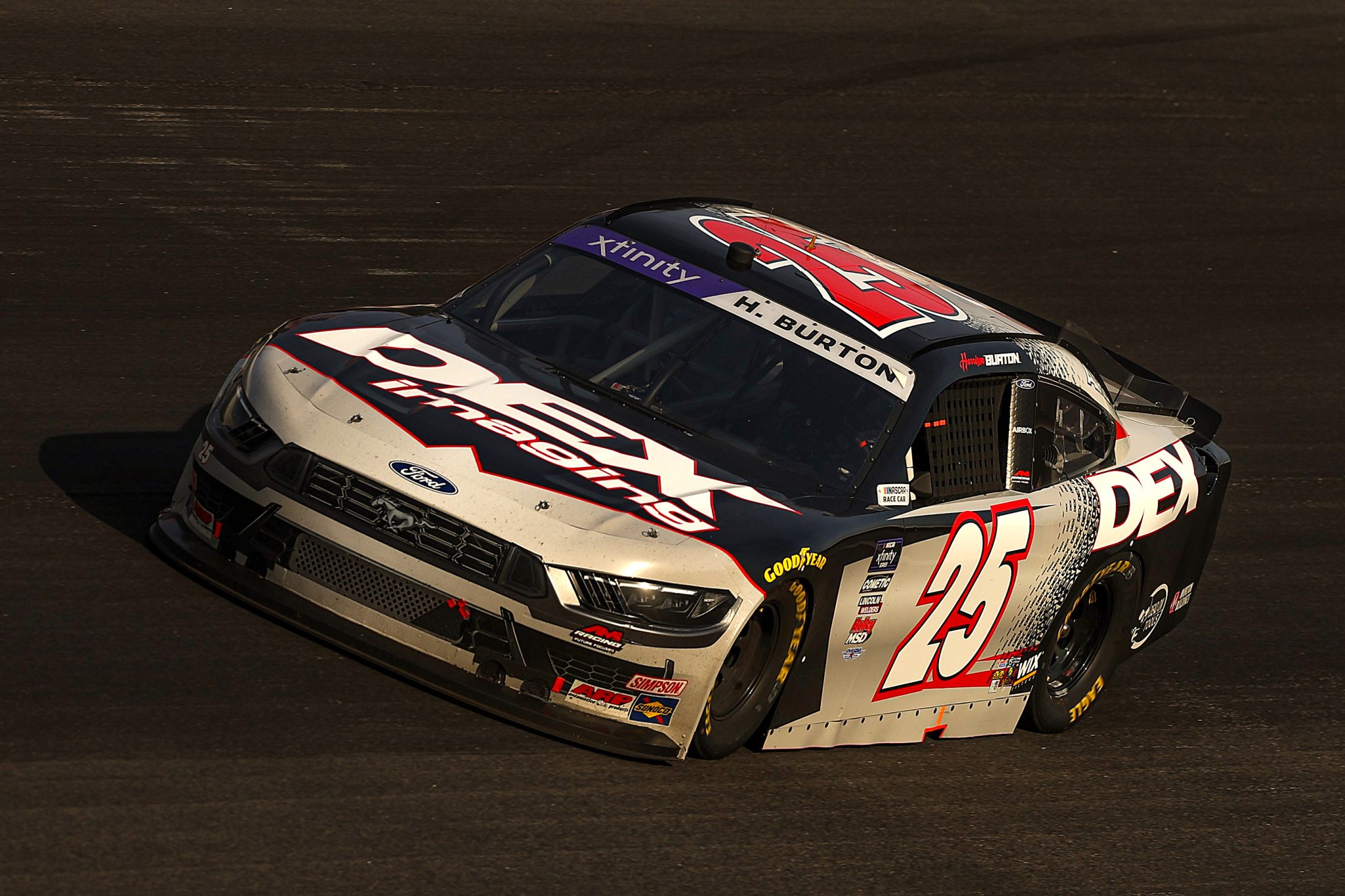 ROCKINGHAM, NORTH CAROLINA - APRIL 19: Harrison Burton, driver of the #25 DEX Imaging Ford, drives during the NASCAR Xfinity Series North Carolina Education Lottery 250 presented by Black's Tire at Rockingham Speedway on April 19, 2025 in Rockingham, North Carolina. (Photo by James Gilbert/Getty Images) | Getty Images