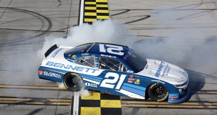 TALLADEGA, ALABAMA - APRIL 26: Austin Hill, driver of the #21 Bennett Transportation Chevrolet, celebrates with a burnout after winning the NASCAR Xfinity Series Ag-Pro 300 at Talladega Superspeedway on April 26, 2025 in Talladega, Alabama. (Photo by Logan Riely/Getty Images) | Getty Images