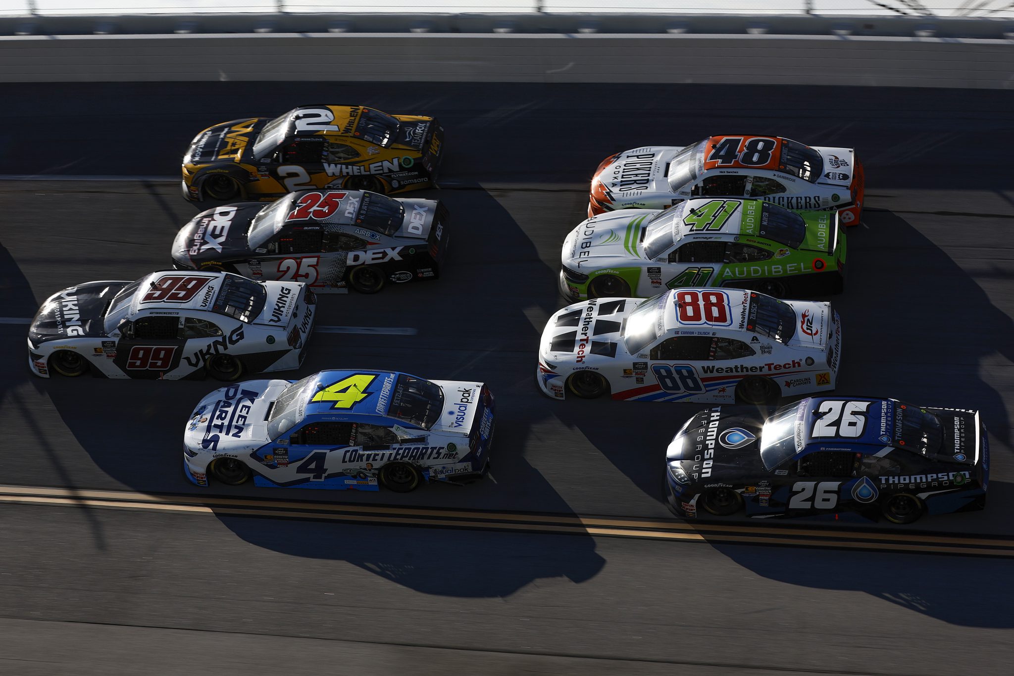 TALLADEGA, ALABAMA - APRIL 26: Parker Retzlaff, driver of the #4 KeenParts.com Chevrolet, Matt DiBenedetto, driver of the #99 Viking Motorsports Chevrolet, Harrison Burton, driver of the #25 DEX Imaging Ford, Jesse Love, driver of the #2 WAT Chevrolet, Dean Thompson, driver of the #26 Thompson Pipe Group Toyota, Connor Zilisch, driver of the #88 WeatherTech Chevrolet, Sam Mayer, driver of the #41 Audibel Ford, and Nick Sanchez, driver of the #48 Pickers Vodka Chevrolet, race during the NASCAR Xfinity Series Ag-Pro 300 at Talladega Superspeedway on April 26, 2025 in Talladega, Alabama. (Photo by Sean Gardner/Getty Images) | Getty Images