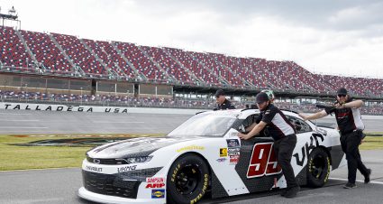 TALLADEGA, ALABAMA - APRIL 25: Crew members push the #99 Viking Motorsports Chevrolet, driven by Matt DiBenedetto, on the grid during qualifying for the NASCAR Xfinity Series Ag-Pro 300 at Talladega Superspeedway on April 25, 2025 in Talladega, Alabama. (Photo by Logan Riely/Getty Images) | Getty Images