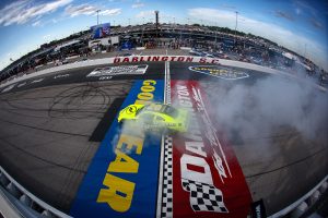 DARLINGTON, SOUTH CAROLINA - APRIL 05: Brandon Jones, driver of the #20 Menards/Turtle Wax Toyota, celebrates with a burnout after winning the NASCAR Xfinity Series port Clips Haircuts VFW Help A Hero 200 at Darlington Raceway on April 05, 2025 in Darlington, South Carolina. (Photo by Jared C. Tilton/Getty Images) | Getty Images