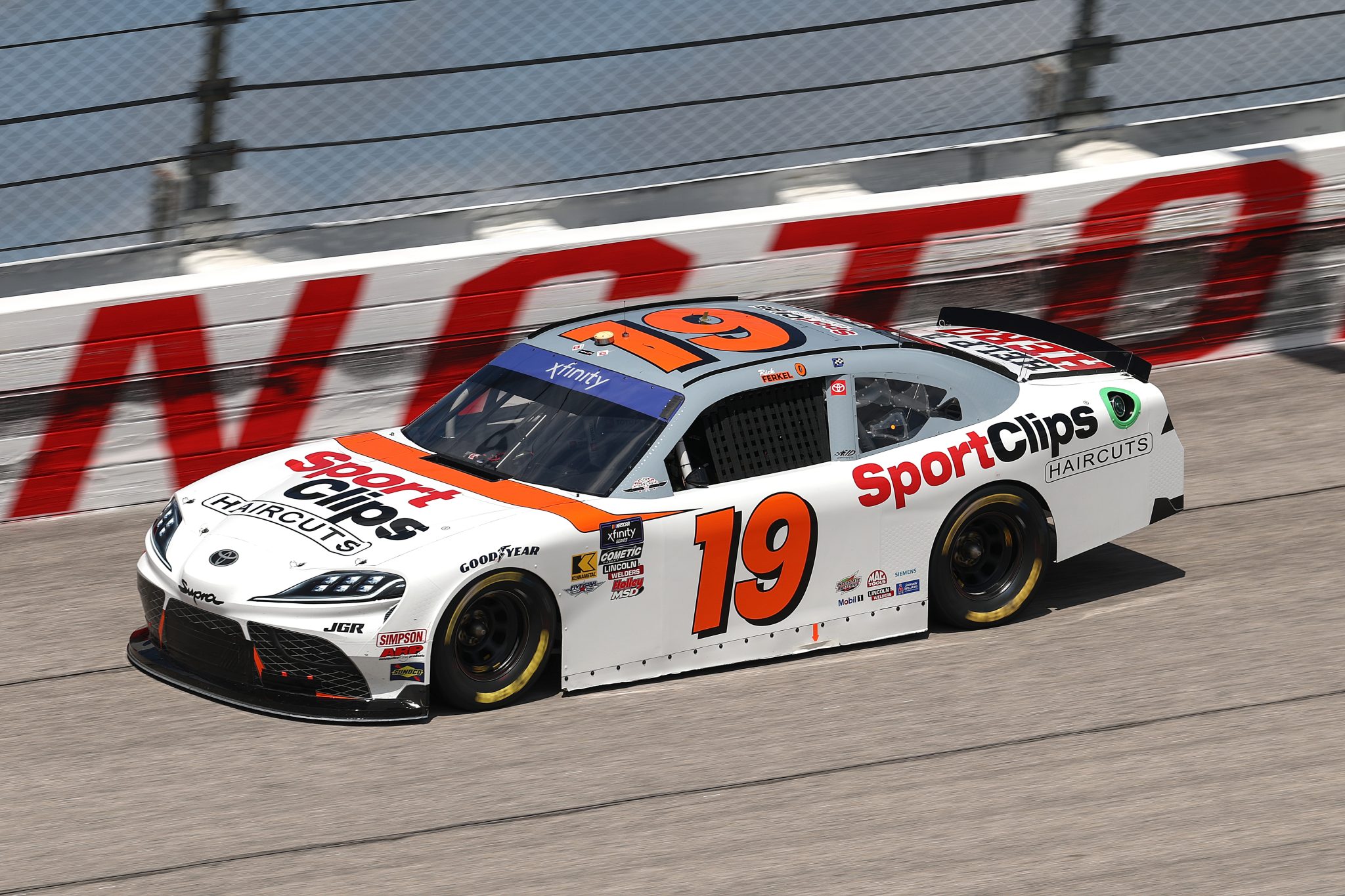 DARLINGTON, SOUTH CAROLINA - APRIL 05: Christopher Bell, driver of the #19 Sport Clips Haircuts Toyota, drives during qualifying for the NASCAR Xfinity Series port Clips Haircuts VFW Help A Hero 200 at Darlington Raceway on April 05, 2025 in Darlington, South Carolina. (Photo by Jared C. Tilton/Getty Images) | Getty Images